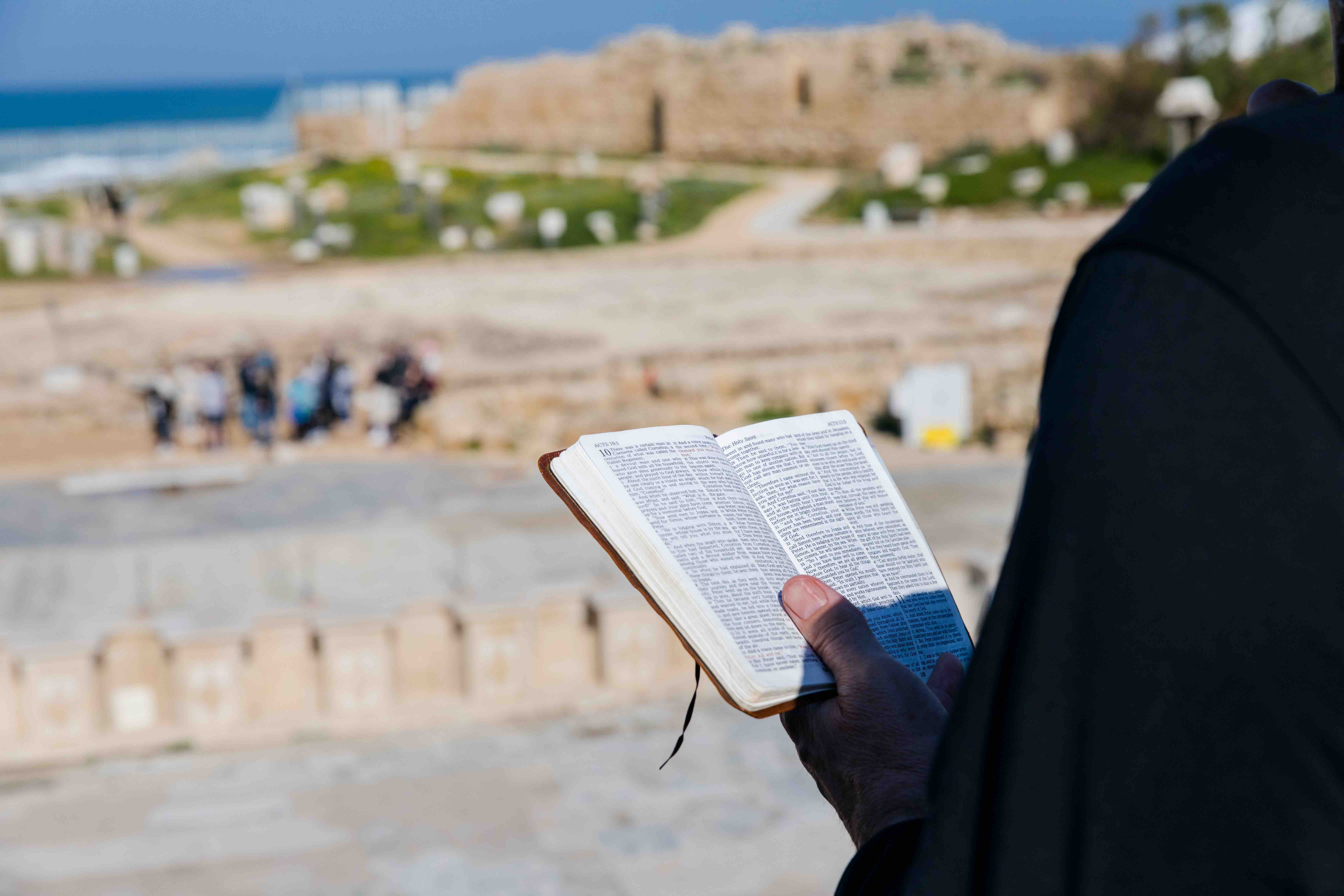 Person reading the bible in Caesarea.
