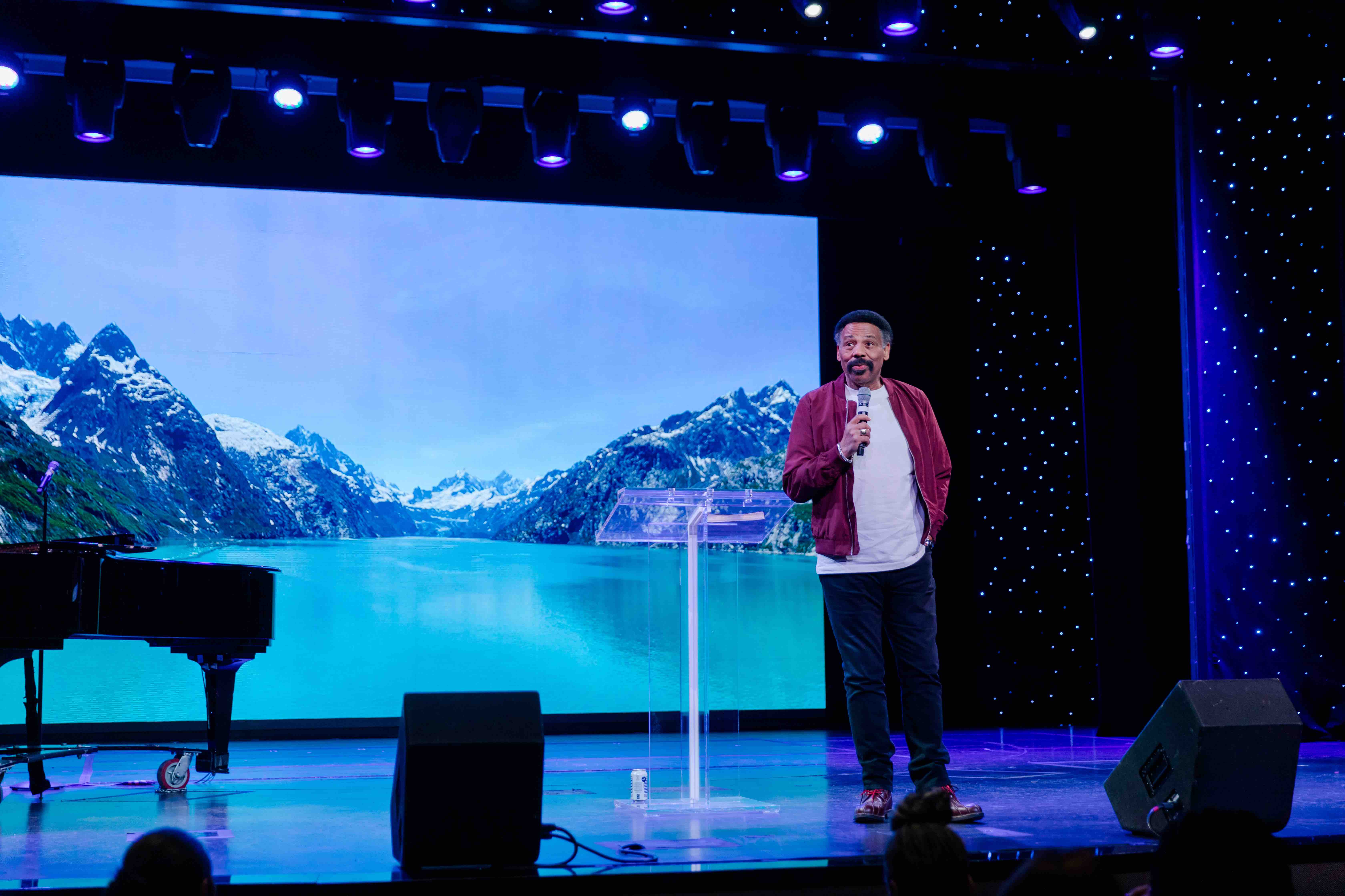 Tony Evans sharing a powerful message with a group of Christian travelers on Alaska cruise