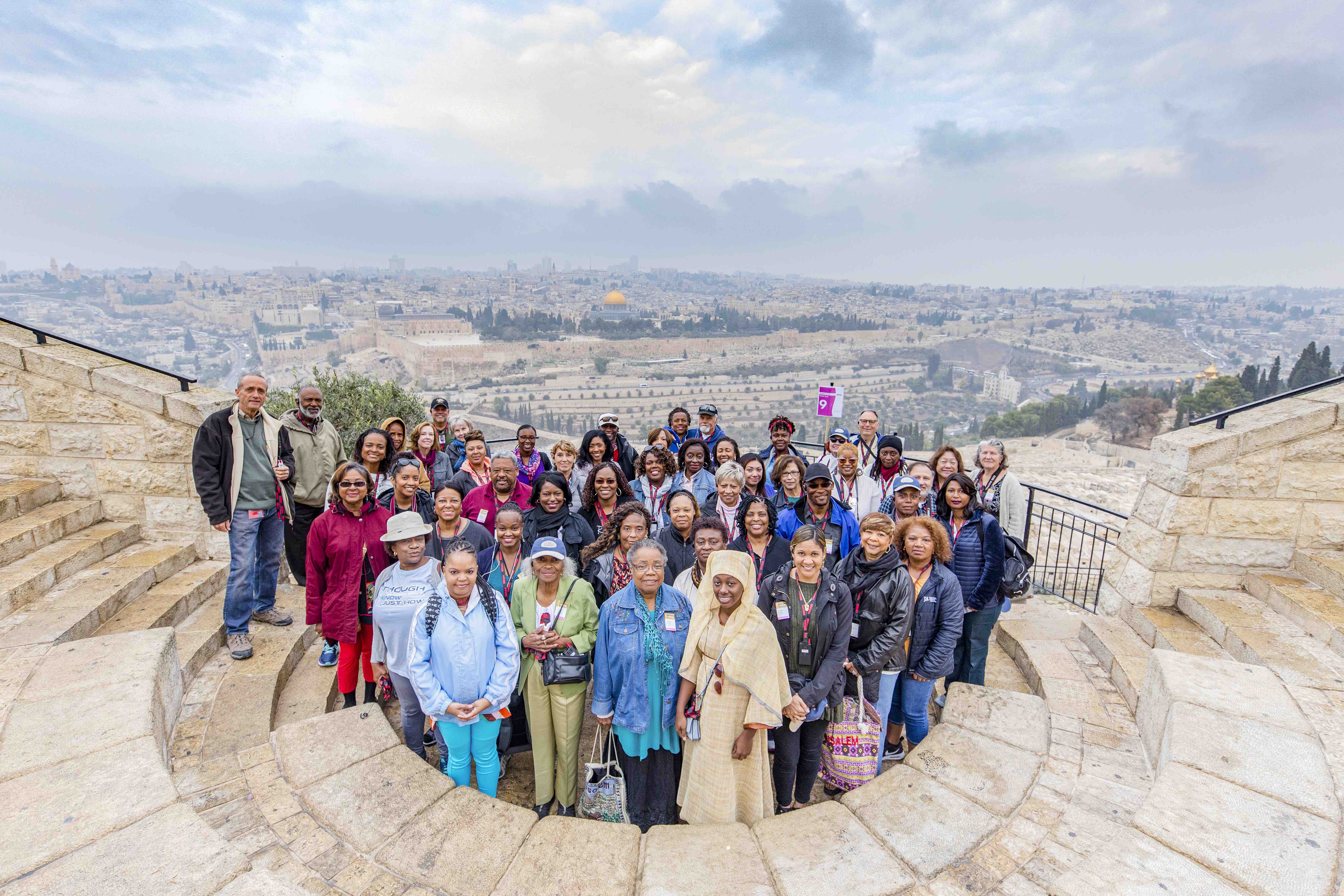 Group of Inspiration travelers on the Mount of Olives, overlooking Jerusalem