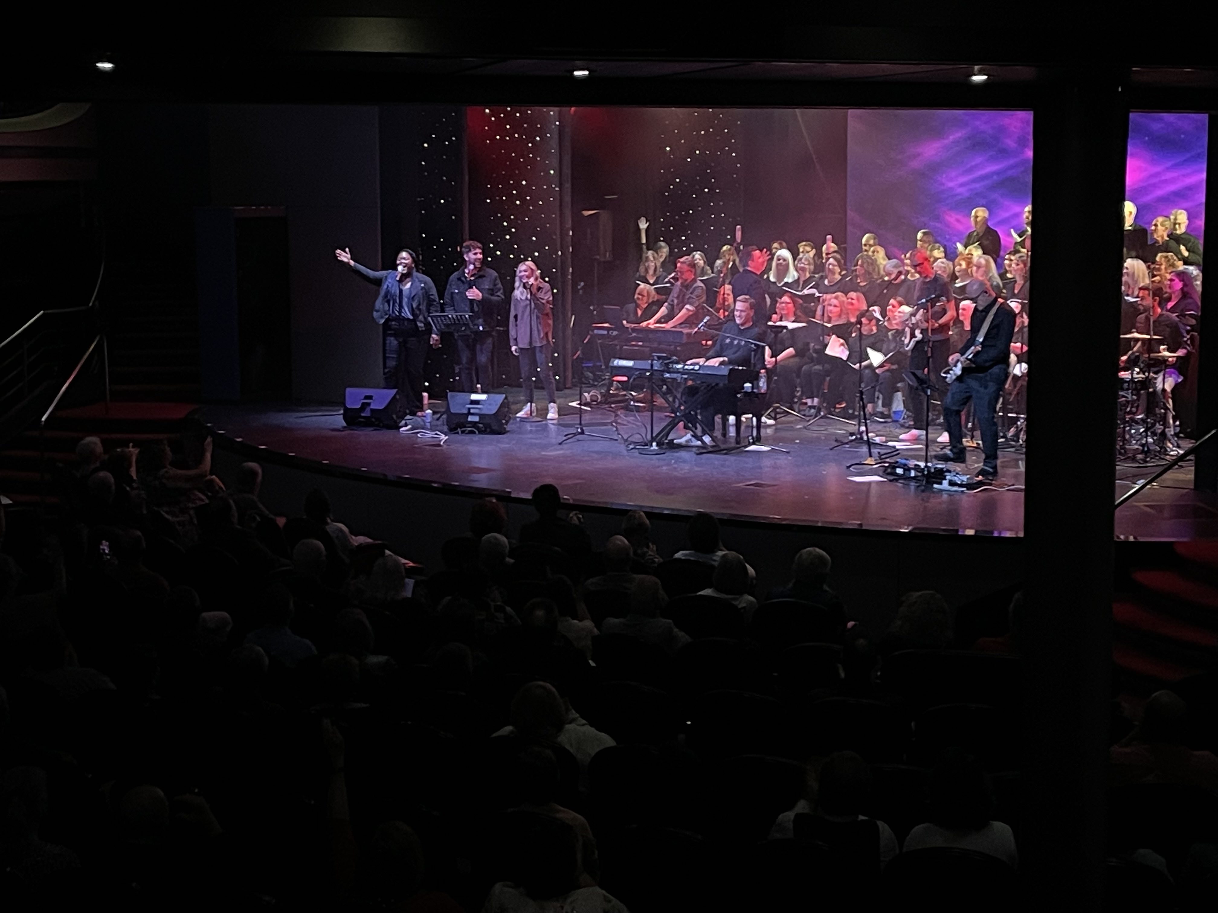 Michael W. Smith performing with the choir during his Alaska Cruise