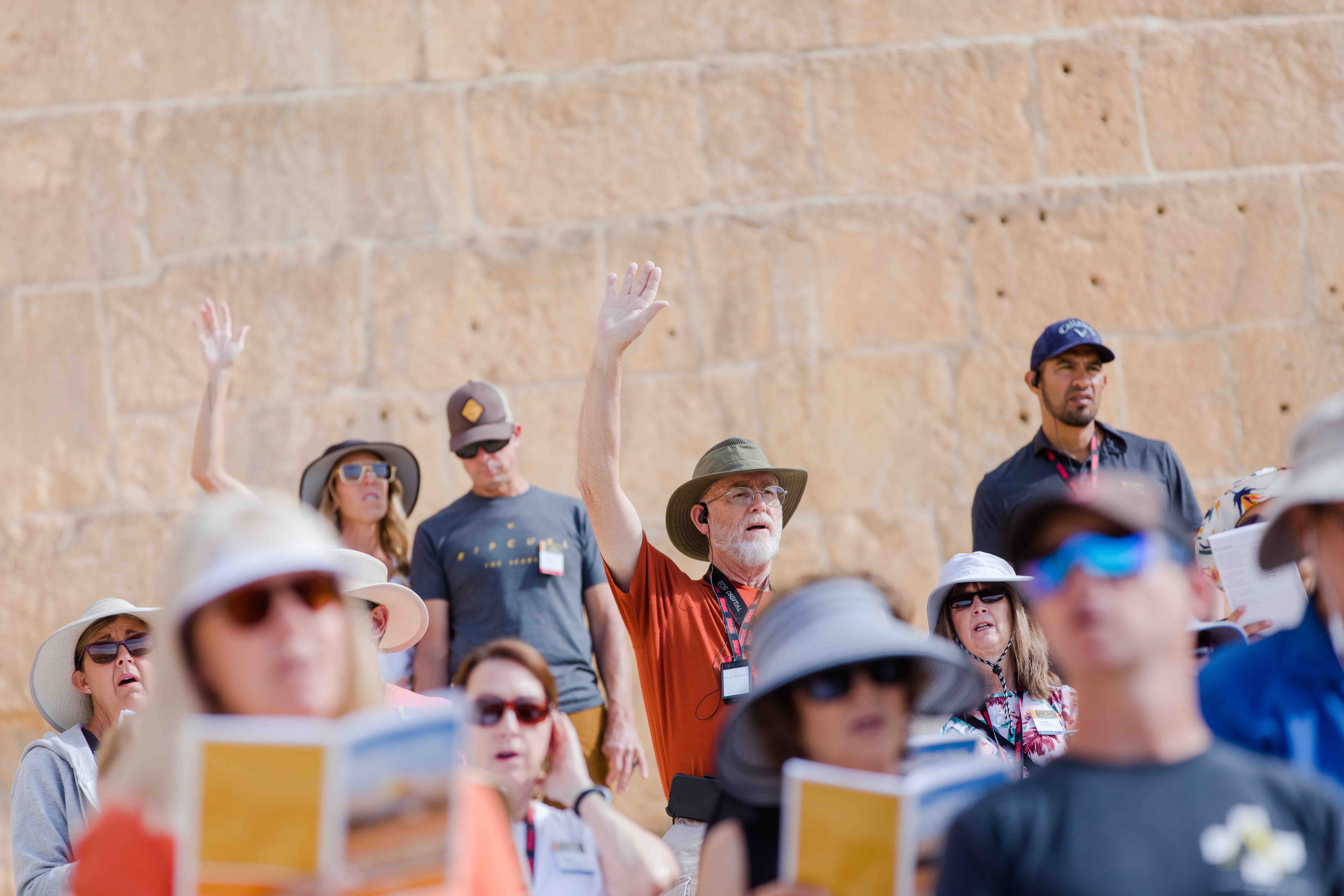 Group of people singing on the Southern Steps in Israel