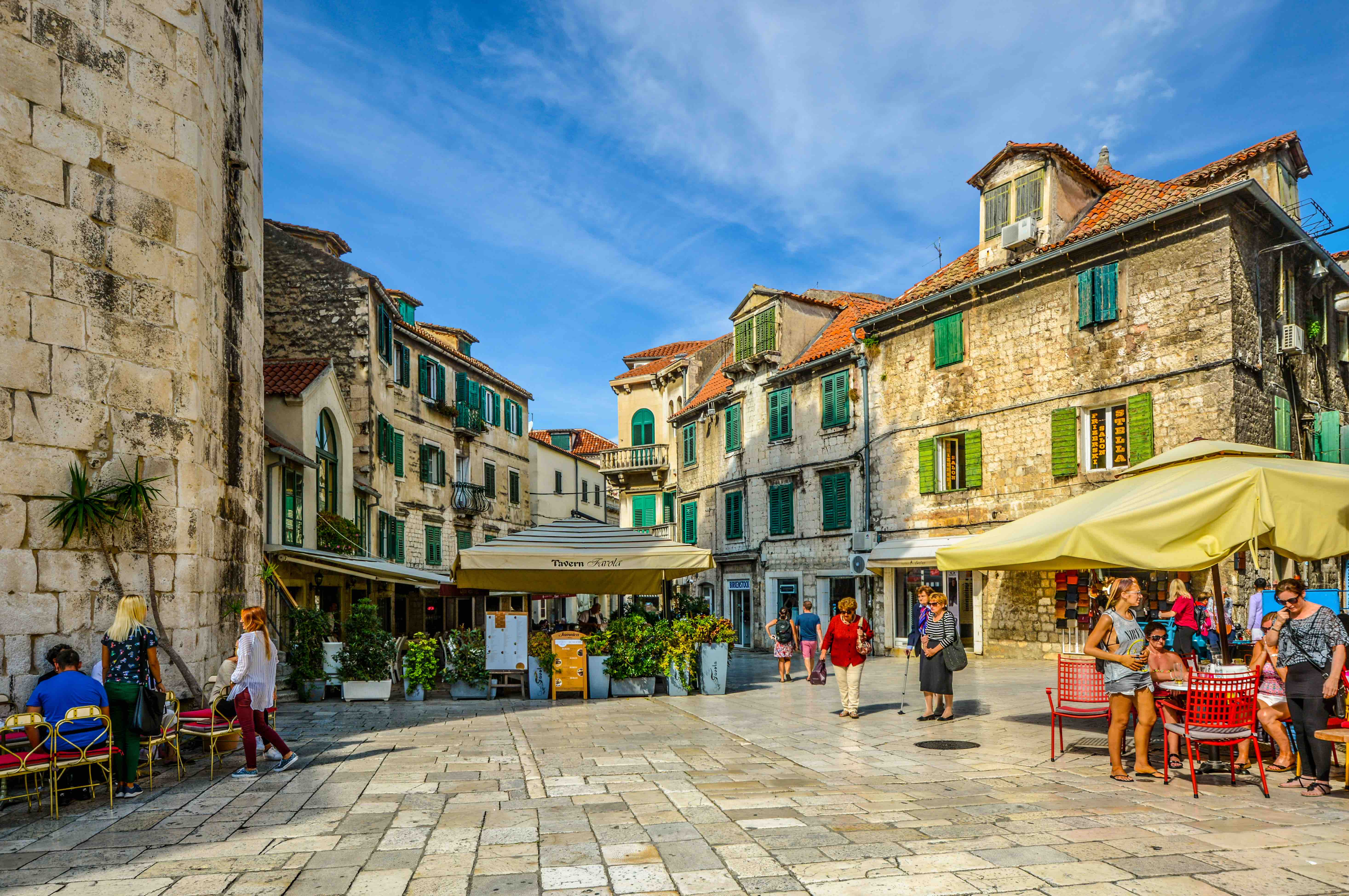Tourists enjoy cafes and shop in Diocletian’s Palace